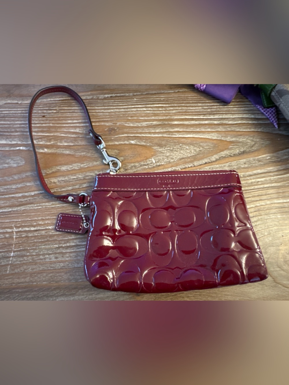 Coach Patent Embossed Wristlet in Burgundy